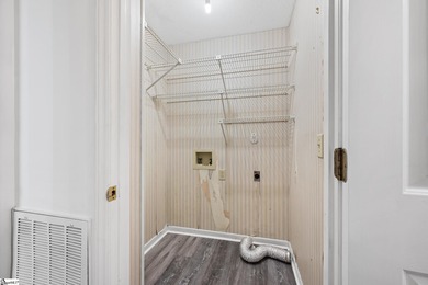 This inviting two-bedroom, two-bath townhome combines comfort on Smithfields Country Club in South Carolina - for sale on GolfHomes.com, golf home, golf lot