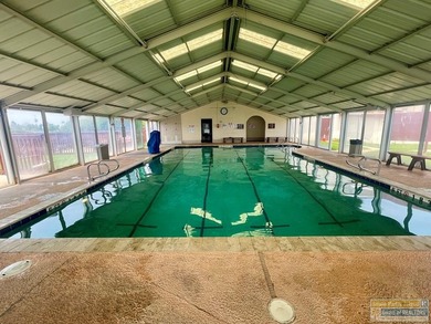 Charming golf-course retreat offering peaceful views and relaxed on Long Island Golf Course in Texas - for sale on GolfHomes.com, golf home, golf lot