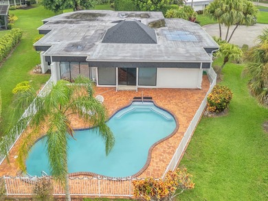 Spacious 3BR/2.5BA home in the prestigious Woodlands of Tamarac on Woodlands Country Club in Florida - for sale on GolfHomes.com, golf home, golf lot