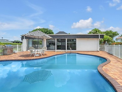 Spacious 3BR/2.5BA home in the prestigious Woodlands of Tamarac on Woodlands Country Club in Florida - for sale on GolfHomes.com, golf home, golf lot