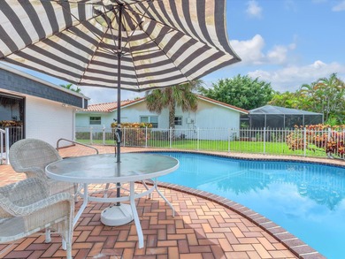 Spacious 3BR/2.5BA home in the prestigious Woodlands of Tamarac on Woodlands Country Club in Florida - for sale on GolfHomes.com, golf home, golf lot