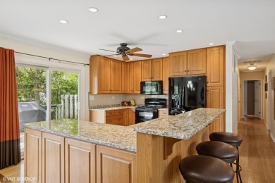 This beautifully updated home with its open floor plan, hardwood on Twin Lakes Golf Course in Illinois - for sale on GolfHomes.com, golf home, golf lot