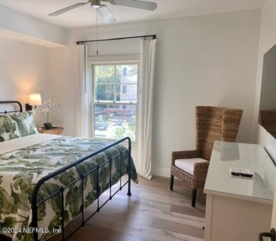 Welcome to your dream retreat! This Tommy Bahama-inspired condo on King and Bear Golf Course/World Golf Village in Florida - for sale on GolfHomes.com, golf home, golf lot