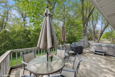 This beautifully updated home with its open floor plan, hardwood on Twin Lakes Golf Course in Illinois - for sale on GolfHomes.com, golf home, golf lot
