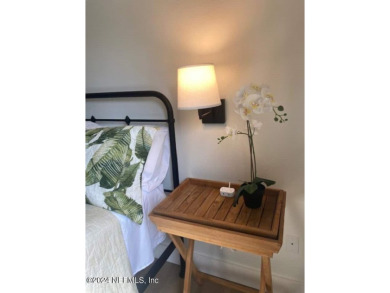 Welcome to your dream retreat! This Tommy Bahama-inspired condo on King and Bear Golf Course/World Golf Village in Florida - for sale on GolfHomes.com, golf home, golf lot