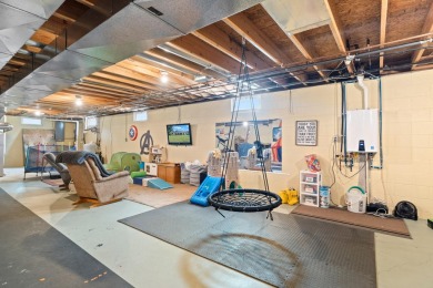 Beautiful Ranch home in Northwest Schools with lake access to on Hankerd Hills Golf Course in Michigan - for sale on GolfHomes.com, golf home, golf lot