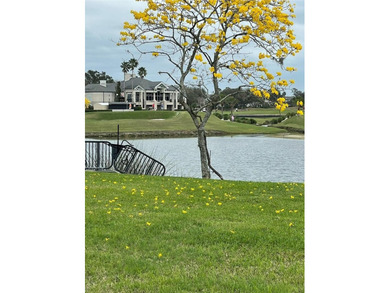 Under contract-accepting backup offers. This special residence on Grasslands Golf and Country Club in Florida - for sale on GolfHomes.com, golf home, golf lot