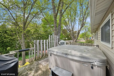 This beautifully updated home with its open floor plan, hardwood on Twin Lakes Golf Course in Illinois - for sale on GolfHomes.com, golf home, golf lot