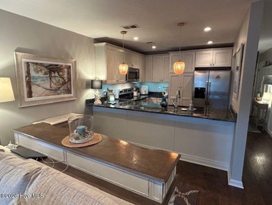 Spectacular intercoastal and golf course views from this on Brick Landing Plantation Yacht and Golf Club in North Carolina - for sale on GolfHomes.com, golf home, golf lot