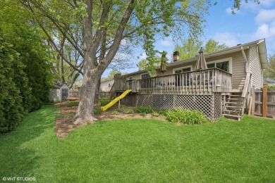 This beautifully updated home with its open floor plan, hardwood on Twin Lakes Golf Course in Illinois - for sale on GolfHomes.com, golf home, golf lot