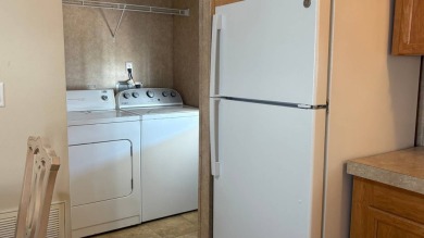 Welcome to this charming 2011 furnished 2-bedroom, 2-bathroom on Sabal Springs Golf and Racquet Club in Florida - for sale on GolfHomes.com, golf home, golf lot