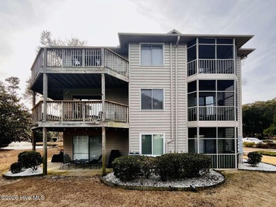 Welcome to this 2nd floor condo in the Oyster Bay community on Oyster Bay Golf Links in North Carolina - for sale on GolfHomes.com, golf home, golf lot