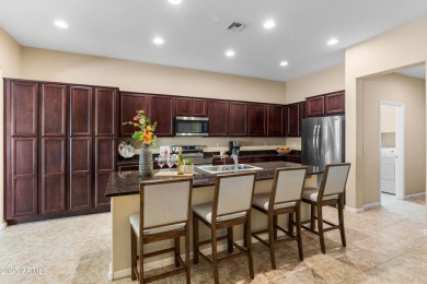 Spacious Villa with rich wood cabinet finishes and granite on Tuscany Falls At Pebble Creek in Arizona - for sale on GolfHomes.com, golf home, golf lot