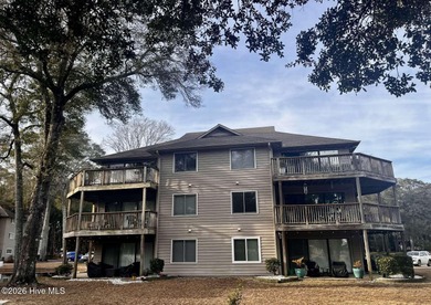 Welcome to this 2nd floor condo in the Oyster Bay community on Oyster Bay Golf Links in North Carolina - for sale on GolfHomes.com, golf home, golf lot