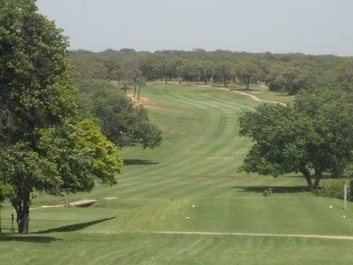 Golfers dream this beautiful build site backs up to hole number on Nocona Hills Golf Course in Texas - for sale on GolfHomes.com, golf home, golf lot