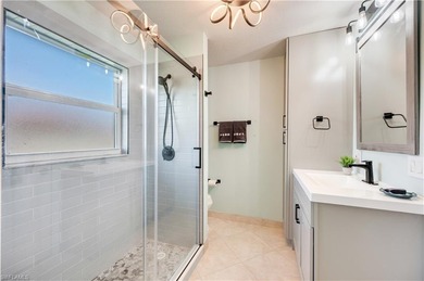 Located in the heart of North Naples, this beautifully on Quail Village Golf Course in Florida - for sale on GolfHomes.com, golf home, golf lot