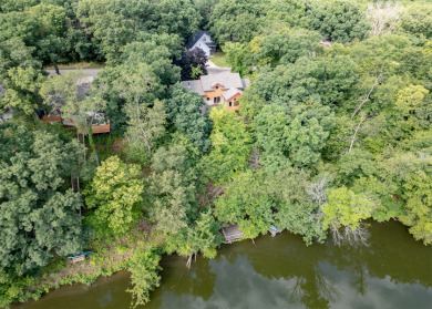 STUNNING TURNKEY CUSTOM-BUILT TIMBER FRAME HOME ON LOST LAKE on Lost Nation Golf Club in Illinois - for sale on GolfHomes.com, golf home, golf lot