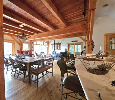 STUNNING TURNKEY CUSTOM-BUILT TIMBER FRAME HOME ON LOST LAKE on Lost Nation Golf Club in Illinois - for sale on GolfHomes.com, golf home, golf lot