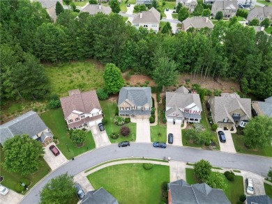 Welcome to this beautifully maintained 5-bedroom, 3-bath home in on Windermere Golf Club in Georgia - for sale on GolfHomes.com, golf home, golf lot