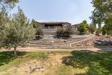 Sitting on over a quarter acre lot & perched just above the 4th on Ruby View Golf Course in Nevada - for sale on GolfHomes.com, golf home, golf lot