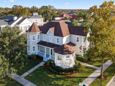 Perched on a large corner lot on coveted Golf Park Drive in Main on Celebration Golf Club in Florida - for sale on GolfHomes.com, golf home, golf lot