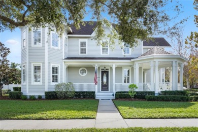 Perched on a large corner lot on coveted Golf Park Drive in Main on Celebration Golf Club in Florida - for sale on GolfHomes.com, golf home, golf lot