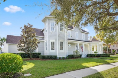 Perched on a large corner lot on coveted Golf Park Drive in Main on Celebration Golf Club in Florida - for sale on GolfHomes.com, golf home, golf lot