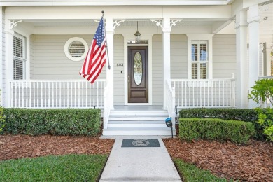 Perched on a large corner lot on coveted Golf Park Drive in Main on Celebration Golf Club in Florida - for sale on GolfHomes.com, golf home, golf lot