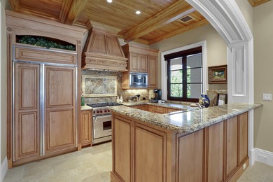 This beautifully appointed four-bedroom villa is nestled behind on The Bears Club in Florida - for sale on GolfHomes.com, golf home, golf lot