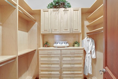 This beautifully appointed four-bedroom villa is nestled behind on The Bears Club in Florida - for sale on GolfHomes.com, golf home, golf lot