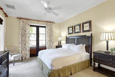 This beautifully appointed four-bedroom villa is nestled behind on The Bears Club in Florida - for sale on GolfHomes.com, golf home, golf lot