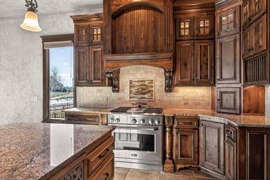 An inviting and warm home situated along one of the neighborhood on Rivercut Golf Course in Missouri - for sale on GolfHomes.com, golf home, golf lot