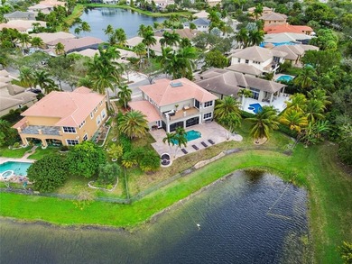 Beautiful 4-bedroom + loft (easily convertible to a 5th bedroom) on Heron Bay Golf Club in Florida - for sale on GolfHomes.com, golf home, golf lot