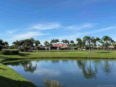 Welcome to this exceptional lakeshore lot boasting expansive on St. Lucie Trail Golf Club in Florida - for sale on GolfHomes.com, golf home, golf lot
