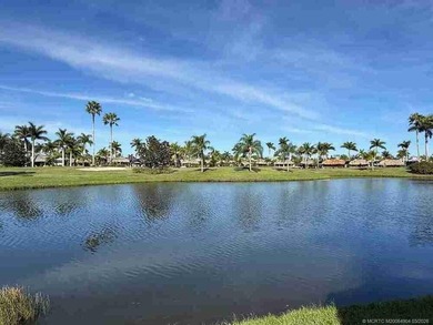Welcome to this exceptional lakeshore lot boasting expansive on St. Lucie Trail Golf Club in Florida - for sale on GolfHomes.com, golf home, golf lot
