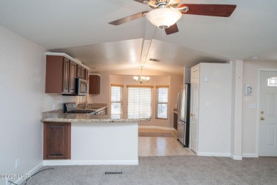 Enjoy Beautiful Lake & Mountain Views From Your Roof Deck With on The Refuge Golf and Country Club in Arizona - for sale on GolfHomes.com, golf home, golf lot