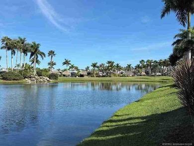 Welcome to this exceptional lakeshore lot boasting expansive on St. Lucie Trail Golf Club in Florida - for sale on GolfHomes.com, golf home, golf lot