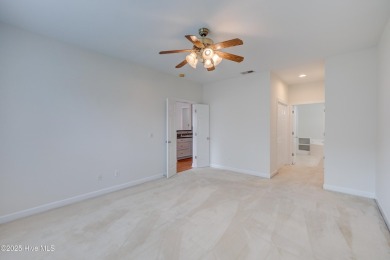 Freshly painted inside, this 3-bedroom, 2-bath townhome in the on Magnolia Greens Golf Plantation in North Carolina - for sale on GolfHomes.com, golf home, golf lot