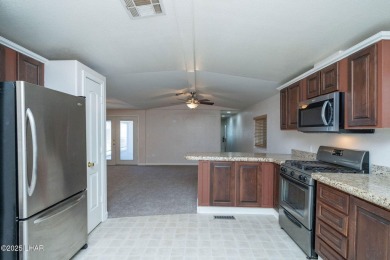 Enjoy Beautiful Lake & Mountain Views From Your Roof Deck With on The Refuge Golf and Country Club in Arizona - for sale on GolfHomes.com, golf home, golf lot