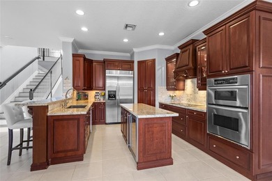 Beautiful 4-bedroom + loft (easily convertible to a 5th bedroom) on Heron Bay Golf Club in Florida - for sale on GolfHomes.com, golf home, golf lot