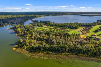 This partially cleared lake front lot is almost an acre and a on  in Florida - for sale on GolfHomes.com, golf home, golf lot