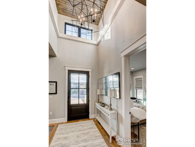 Harmony Club Stunner offering a perfect balance of refined on Harmony Golf Club in Colorado - for sale on GolfHomes.com, golf home, golf lot