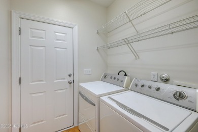 Freshly painted inside, this 3-bedroom, 2-bath townhome in the on Magnolia Greens Golf Plantation in North Carolina - for sale on GolfHomes.com, golf home, golf lot