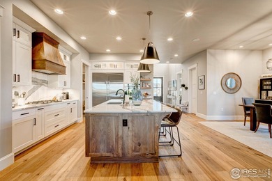 Harmony Club Stunner offering a perfect balance of refined on Harmony Golf Club in Colorado - for sale on GolfHomes.com, golf home, golf lot