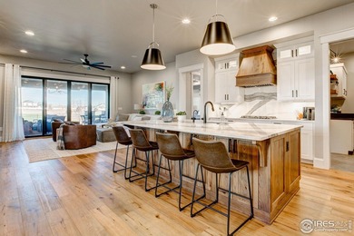 Harmony Club Stunner offering a perfect balance of refined on Harmony Golf Club in Colorado - for sale on GolfHomes.com, golf home, golf lot