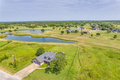 Golf course home with pond view on # 5 fairway of the new golf on White Bluff Resort - New Course in Texas - for sale on GolfHomes.com, golf home, golf lot