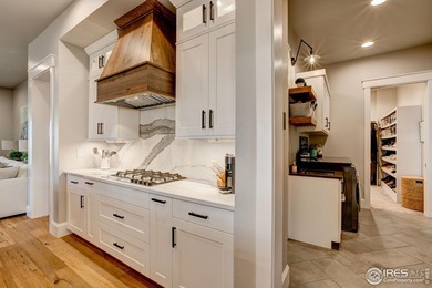 Harmony Club Stunner offering a perfect balance of refined on Harmony Golf Club in Colorado - for sale on GolfHomes.com, golf home, golf lot