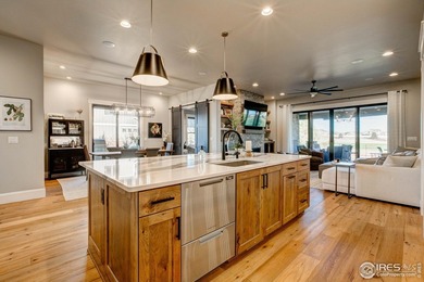 Harmony Club Stunner offering a perfect balance of refined on Harmony Golf Club in Colorado - for sale on GolfHomes.com, golf home, golf lot