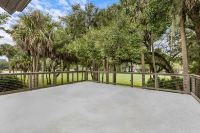 Nestled on a half-acre homesite beneath majestic oak trees on The Seabrook Island Club in South Carolina - for sale on GolfHomes.com, golf home, golf lot