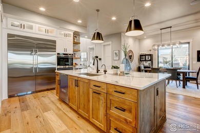 Harmony Club Stunner offering a perfect balance of refined on Harmony Golf Club in Colorado - for sale on GolfHomes.com, golf home, golf lot